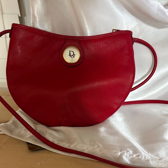 Dior Handbags - Vintage Dior Red Leather Crescent Crossbody with Gold Logo Medallion